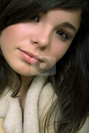 To use this stock image in your creative project, please select the size you need over to the right and click the "Add to Cart" button.
Your downloaded image will come with the Cutcaster watermark removed so don’t worry about the watermark you see on this page. Beautiful stock photo, Young beautiful brunette portrait against black background by Rui Vale de Sousa