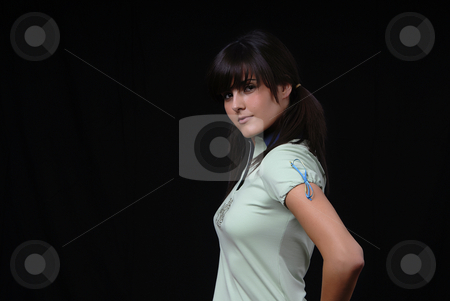 To use this stock image in your creative project, please select the size you need over to the right and click the "Add to Cart" button.
Your downloaded image will come with the Cutcaster watermark removed so don’t worry about the watermark you see on this page. Fashion stock photo, Beautiful young woman posing in black background by Rui Vale de Sousa
