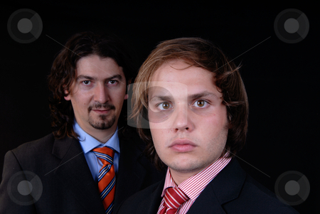 To use this stock image in your creative project, please select the size you need over to the right and click the "Add to Cart" button.
Your downloaded image will come with the Cutcaster watermark removed so don’t worry about the watermark you see on this page. Men stock photo, Business man portrait isolated on black background, focus on the right man by Rui Vale de Sousa