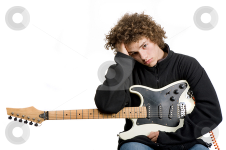 To use this stock image in your creative project, please select the size you need over to the right and click the "Add to Cart" button.
Your downloaded image will come with the Cutcaster watermark removed so don’t worry about the watermark you see on this page. Musician stock photo, Young man musician with guitar, studio picture by Rui Vale de Sousa