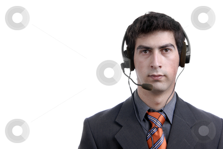 To use this stock image in your creative project, please select the size you need over to the right and click the "Add to Cart" button.
Your downloaded image will come with the Cutcaster watermark removed so don’t worry about the watermark you see on this page. Call stock photo, Young call center man talking by the phone by Rui Vale de Sousa