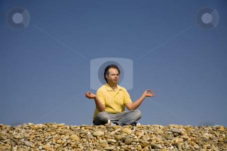 To use this stock image in your creative project, please select the size you need over to the right and click the "Add to Cart" button.
Your downloaded image will come with the Cutcaster watermark removed so don’t worry about the watermark you see on this page. Meditation stock photo, Young man at the beach in meditation by Rui Vale de Sousa