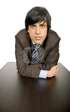 To use this stock image in your creative project, please select the size you need over to the right and click the "Add to Cart" button.
Your downloaded image will come with the Cutcaster watermark removed so don’t worry about the watermark you see on this page. Worried stock photo, Young worried business man, on a desk by Rui Vale de Sousa