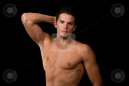 To use this stock image in your creative project, please select the size you need over to the right and click the "Add to Cart" button.
Your downloaded image will come with the Cutcaster watermark removed so don’t worry about the watermark you see on this page. Young stock photo, Young sensual man on a black background by Rui Vale de Sousa