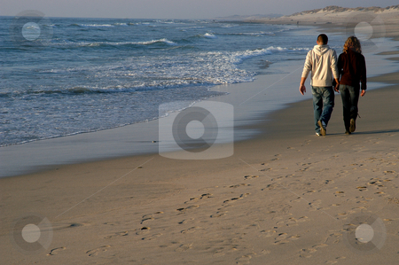 To use this stock image in your creative project, please select the size you need over to the right and click the "Add to Cart" button.
Your downloaded image will come with the Cutcaster watermark removed so don’t worry about the watermark you see on this page. Walk stock photo, Couple on the beach by Rui Vale de Sousa