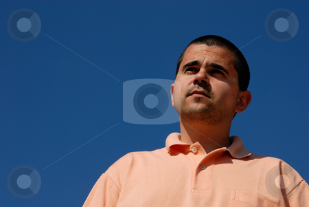 To use this stock image in your creative project, please select the size you need over to the right and click the "Add to Cart" button.
Your downloaded image will come with the Cutcaster watermark removed so don’t worry about the watermark you see on this page. Wondering stock photo, Young casual man portrait with the sky as background by Rui Vale de Sousa