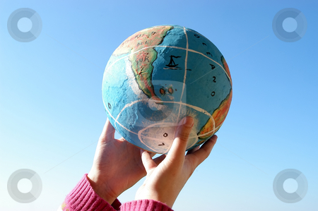 To use this stock image in your creative project, please select the size you need over to the right and click the "Add to Cart" button.
Your downloaded image will come with the Cutcaster watermark removed so don’t worry about the watermark you see on this page. Holding stock photo, Hands holding a globe by Rui Vale de Sousa