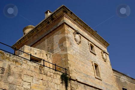 To use this stock image in your creative project, please select the size you need over to the right and click the "Add to Cart" button.
Your downloaded image will come with the Cutcaster watermark removed so don’t worry about the watermark you see on this page. Building stock photo, Ancient building detail in the island of malta by Rui Vale de Sousa