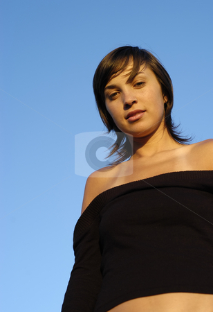 To use this stock image in your creative project, please select the size you need over to the right and click the "Add to Cart" button.
Your downloaded image will come with the Cutcaster watermark removed so don’t worry about the watermark you see on this page. Girl stock photo, Young woman with the blue sky as background by Rui Vale de Sousa