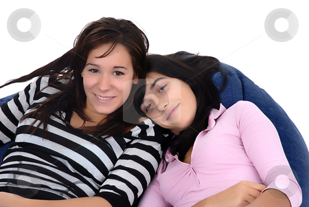 To use this stock image in your creative project, please select the size you need over to the right and click the "Add to Cart" button.
Your downloaded image will come with the Cutcaster watermark removed so don’t worry about the watermark you see on this page. Girls stock photo, Two young casual girls portrait in studio by Rui Vale de Sousa