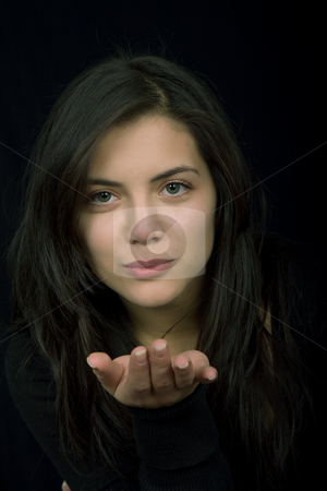 To use this stock image in your creative project, please select the size you need over to the right and click the "Add to Cart" button.
Your downloaded image will come with the Cutcaster watermark removed so don’t worry about the watermark you see on this page. Kiss stock photo, Young woman portrait isolated on black background by Rui Vale de Sousa