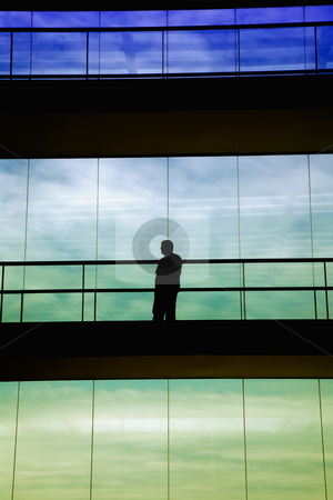 To use this stock image in your creative project, please select the size you need over to the right and click the "Add to Cart" button.
Your downloaded image will come with the Cutcaster watermark removed so don’t worry about the watermark you see on this page. Shape stock photo, Worker inside the modern building in silhouette by Rui Vale de Sousa