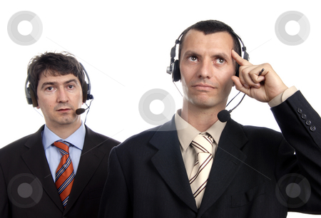 To use this stock image in your creative project, please select the size you need over to the right and click the "Add to Cart" button.
Your downloaded image will come with the Cutcaster watermark removed so don’t worry about the watermark you see on this page. Call center stock photo, Two young call center men talking by the phone by Rui Vale de Sousa