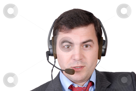 To use this stock image in your creative project, please select the size you need over to the right and click the "Add to Cart" button.
Your downloaded image will come with the Cutcaster watermark removed so don’t worry about the watermark you see on this page. Call stock photo, Young call center man talking by the phone by Rui Vale de Sousa