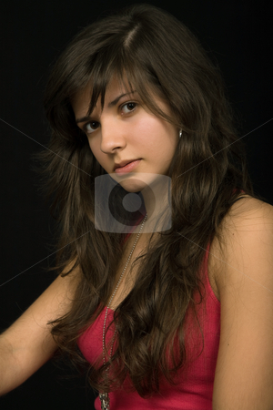 To use this stock image in your creative project, please select the size you need over to the right and click the "Add to Cart" button.
Your downloaded image will come with the Cutcaster watermark removed so don’t worry about the watermark you see on this page. Brunette stock photo, Young beautiful brunette portrait against black background by Rui Vale de Sousa