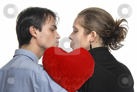 To use this stock image in your creative project, please select the size you need over to the right and click the "Add to Cart" button.
Your downloaded image will come with the Cutcaster watermark removed so don’t worry about the watermark you see on this page. Love stock photo, Young couple in a kiss, isolated on white by Rui Vale de Sousa