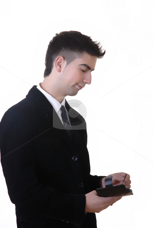To use this stock image in your creative project, please select the size you need over to the right and click the "Add to Cart" button.
Your downloaded image will come with the Cutcaster watermark removed so don’t worry about the watermark you see on this page. Working stock photo, Young man with pda in a white background by Rui Vale de Sousa