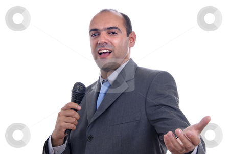 To use this stock image in your creative project, please select the size you need over to the right and click the "Add to Cart" button.
Your downloaded image will come with the Cutcaster watermark removed so don’t worry about the watermark you see on this page. Singing stock photo, Young business man talking on a microphone by Rui Vale de Sousa