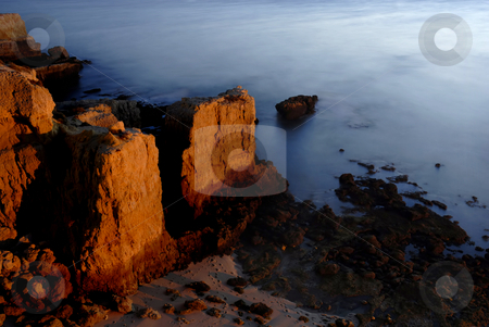 To use this stock image in your creative project, please select the size you need over to the right and click the "Add to Cart" button.
Your downloaded image will come with the Cutcaster watermark removed so don’t worry about the watermark you see on this page. Sea over rocks stock photo, Long Exposure of sea over rocks - dreamy feel by Rui Vale de Sousa