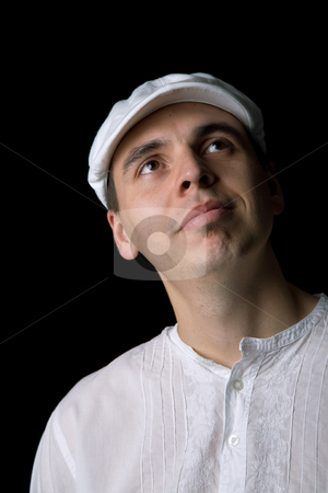 To use this stock image in your creative project, please select the size you need over to the right and click the "Add to Cart" button.
Your downloaded image will come with the Cutcaster watermark removed so don’t worry about the watermark you see on this page. Wondering stock photo, Young happy man portrait, on a black background by Rui Vale de Sousa