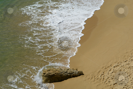 To use this stock image in your creative project, please select the size you need over to the right and click the "Add to Cart" button.
Your downloaded image will come with the Cutcaster watermark removed so don’t worry about the watermark you see on this page. Beach stock photo, White wave in the sand at the beach by Rui Vale de Sousa