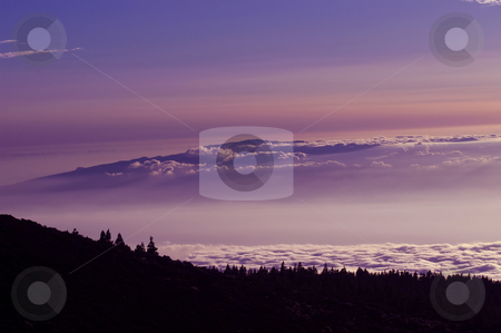 To use this stock image in your creative project, please select the size you need over to the right and click the "Add to Cart" button.
Your downloaded image will come with the Cutcaster watermark removed so don’t worry about the watermark you see on this page. Clouds stock photo, Clouds at the mountains at the sunset, in tenerife island by Rui Vale de Sousa