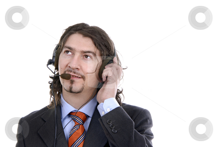 To use this stock image in your creative project, please select the size you need over to the right and click the "Add to Cart" button.
Your downloaded image will come with the Cutcaster watermark removed so don’t worry about the watermark you see on this page. Talking stock photo, Young call center man talking by the phone by Rui Vale de Sousa