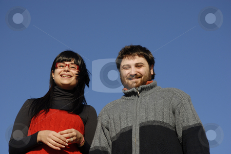 To use this stock image in your creative project, please select the size you need over to the right and click the "Add to Cart" button.
Your downloaded image will come with the Cutcaster watermark removed so don’t worry about the watermark you see on this page. Couple stock photo, Young couple with the sky as background by Rui Vale de Sousa