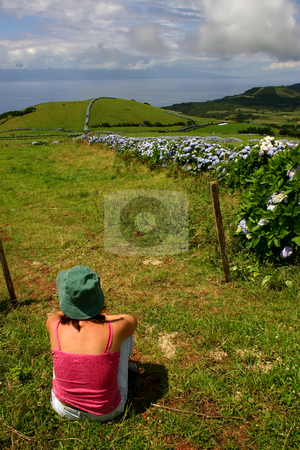 To use this stock image in your creative project, please select the size you need over to the right and click the "Add to Cart" button.
Your downloaded image will come with the Cutcaster watermark removed so don’t worry about the watermark you see on this page. Relax stock photo, Woman on the azores fields by Rui Vale de Sousa