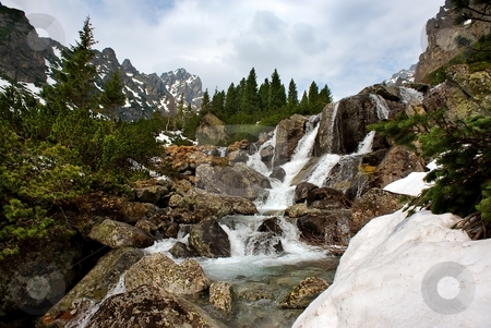 To use this stock image in your creative project, please select the size you need over to the right and click the "Add to Cart" button.
Your downloaded image will come with the Cutcaster watermark removed so don’t worry about the watermark you see on this page. Creek in mountains stock photo, Creek in mountains, small waterfall by Juraj Kovacik