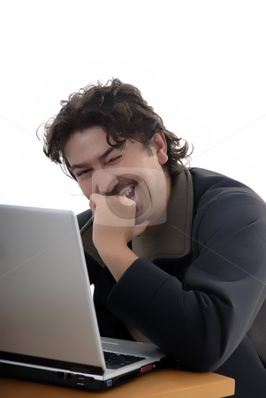 To use this stock image in your creative project, please select the size you need over to the right and click the "Add to Cart" button.
Your downloaded image will come with the Cutcaster watermark removed so don’t worry about the watermark you see on this page. Laugh stock photo, Young man laughing wile working with computer by Rui Vale de Sousa
