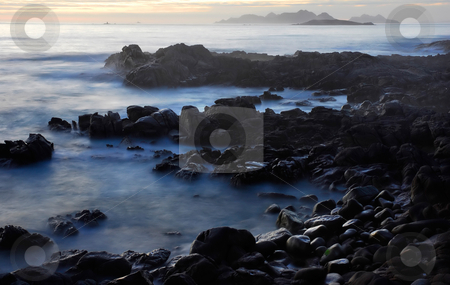 To use this stock image in your creative project, please select the size you need over to the right and click the "Add to Cart" button.
Your downloaded image will come with the Cutcaster watermark removed so don’t worry about the watermark you see on this page. Ocean stock photo, Beach at dawn at the south of portugal by Rui Vale de Sousa