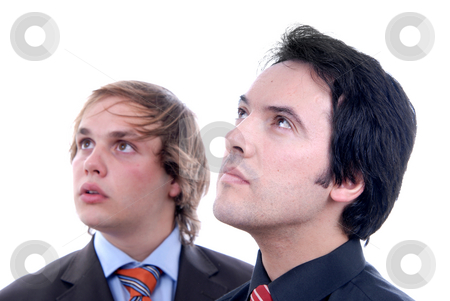 To use this stock image in your creative project, please select the size you need over to the right and click the "Add to Cart" button.
Your downloaded image will come with the Cutcaster watermark removed so don’t worry about the watermark you see on this page. Wondering stock photo, Two young business men portrait on white. focus on the right man by Rui Vale de Sousa