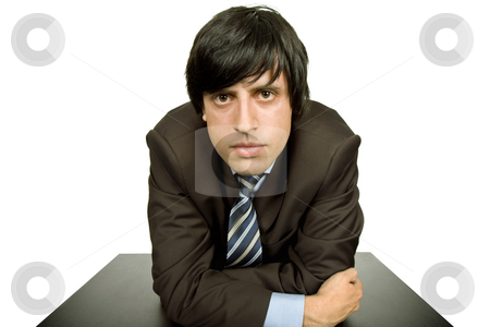To use this stock image in your creative project, please select the size you need over to the right and click the "Add to Cart" button.
Your downloaded image will come with the Cutcaster watermark removed so don’t worry about the watermark you see on this page. Worried stock photo, Young worried business man, on a desk by Rui Vale de Sousa