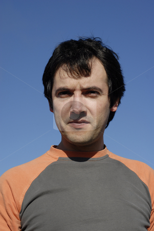 To use this stock image in your creative project, please select the size you need over to the right and click the "Add to Cart" button.
Your downloaded image will come with the Cutcaster watermark removed so don’t worry about the watermark you see on this page. Portrait stock photo, Man portrait against the sun over a clean blue sky by Rui Vale de Sousa