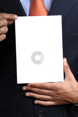 To use this stock image in your creative project, please select the size you need over to the right and click the "Add to Cart" button.
Your downloaded image will come with the Cutcaster watermark removed so don’t worry about the watermark you see on this page. Advertising stock photo, Business man holding a card in his chest by Rui Vale de Sousa