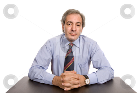 To use this stock image in your creative project, please select the size you need over to the right and click the "Add to Cart" button.
Your downloaded image will come with the Cutcaster watermark removed so don’t worry about the watermark you see on this page. Thinking stock photo, Mature business man on a desk, isolated on white by Rui Vale de Sousa