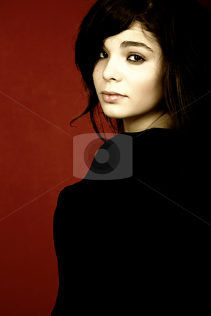 To use this stock image in your creative project, please select the size you need over to the right and click the "Add to Cart" button.
Your downloaded image will come with the Cutcaster watermark removed so don’t worry about the watermark you see on this page. Woman stock photo, Young woman portrait isolated on red background by Rui Vale de Sousa