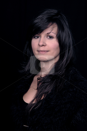 To use this stock image in your creative project, please select the size you need over to the right and click the "Add to Cart" button.
Your downloaded image will come with the Cutcaster watermark removed so don’t worry about the watermark you see on this page. Beautiful stock photo, Young beautiful woman portrait on black background by Rui Vale de Sousa