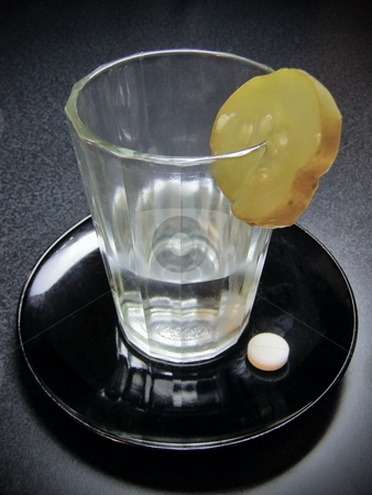 To use this stock image in your creative project, please select the size you need over to the right and click the "Add to Cart" button.
Your downloaded image will come with the Cutcaster watermark removed so don’t worry about the watermark you see on this page. Bad morning stock photo, Glass of alcohol with cucumber and tablet on the saucer by Sergej Razvodovskij