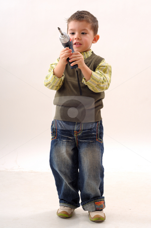 To use this stock image in your creative project, please select the size you need over to the right and click the "Add to Cart" button.
Your downloaded image will come with the Cutcaster watermark removed so don’t worry about the watermark you see on this page. Tools and child stock photo, Tools for construction and a little boy using them by Dragos Iliescu