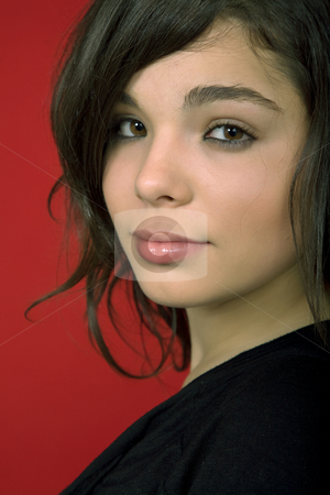 To use this stock image in your creative project, please select the size you need over to the right and click the "Add to Cart" button.
Your downloaded image will come with the Cutcaster watermark removed so don’t worry about the watermark you see on this page. Woman stock photo, Young woman portrait isolated on red background by Rui Vale de Sousa
