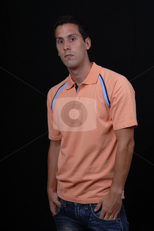 To use this stock image in your creative project, please select the size you need over to the right and click the "Add to Cart" button.
Your downloaded image will come with the Cutcaster watermark removed so don’t worry about the watermark you see on this page. Casual stock photo, Young casual man isolated on black background by Rui Vale de Sousa