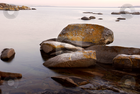 To use this stock image in your creative project, please select the size you need over to the right and click the "Add to Cart" button.
Your downloaded image will come with the Cutcaster watermark removed so don’t worry about the watermark you see on this page. Rocks stock photo, Mist in the ocean, coast of north of spain by Rui Vale de Sousa