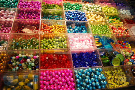 To use this stock image in your creative project, please select the size you need over to the right and click the "Add to Cart" button.
Your downloaded image will come with the Cutcaster watermark removed so don’t worry about the watermark you see on this page. Multicoloured beads in bijouterie shop stock photo, Multicoloured beads sorted in boxes for sale by Leyla Akhundova