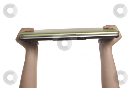 To use this stock image in your creative project, please select the size you need over to the right and click the "Add to Cart" button.
Your downloaded image will come with the Cutcaster watermark removed so don’t worry about the watermark you see on this page. A womans hands holding a laptop stock photo, A womans hands are holding a laptop high overhead by Matt Baker