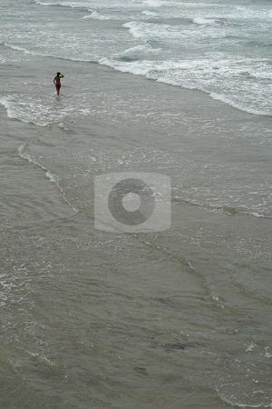 To use this stock image in your creative project, please select the size you need over to the right and click the "Add to Cart" button.
Your downloaded image will come with the Cutcaster watermark removed so don’t worry about the watermark you see on this page. Beach stock photo, Woman at the beach with lots of waves by Rui Vale de Sousa