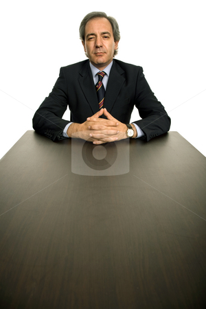 To use this stock image in your creative project, please select the size you need over to the right and click the "Add to Cart" button.
Your downloaded image will come with the Cutcaster watermark removed so don’t worry about the watermark you see on this page. Pensive stock photo, Mature business man on a desk, isolated on white by Rui Vale de Sousa