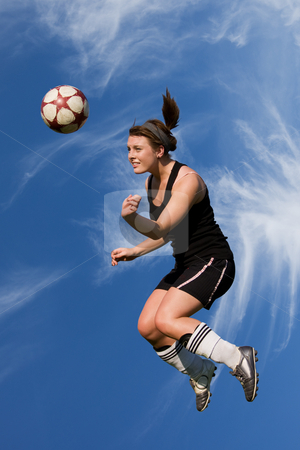 To use this stock image in your creative project, please select the size you need over to the right and click the "Add to Cart" button.
Your downloaded image will come with the Cutcaster watermark removed so don’t worry about the watermark you see on this page. High header stock photo, Athletic female high in the air heading a soccer ball by Steve Mcsweeny