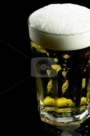 To use this stock image in your creative project, please select the size you need over to the right and click the "Add to Cart" button.
Your downloaded image will come with the Cutcaster watermark removed so don’t worry about the watermark you see on this page. Glass of beer stock photo, Glass of lager beer over black background by Francesco Perre